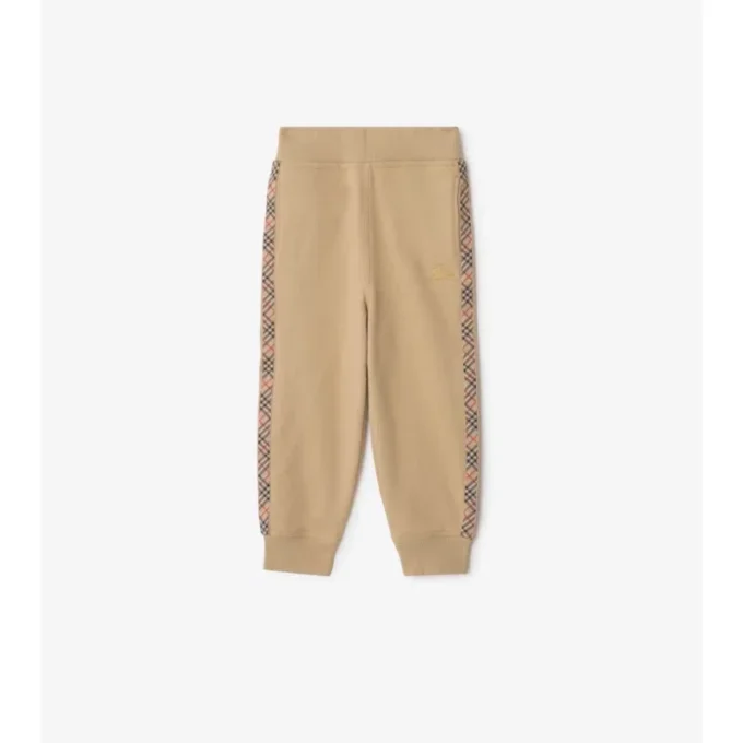 Bavlněné joggingové kalhoty s kostkovaným lemováním Bavlněné joggingové kalhoty s kostkovaným lemováním