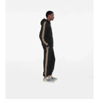 Bavlněné joggingové kalhoty s kostkovaným lemováním