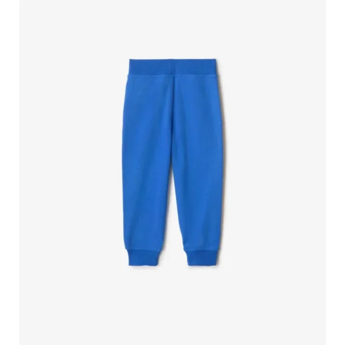 Bavlněné joggingové kalhoty s kostkovaným lemováním Bavlněné joggingové kalhoty s kostkovaným lemováním