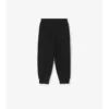 Bavlněné joggingové kalhoty s kostkovaným lemováním Bavlněné joggingové kalhoty s kostkovaným lemováním