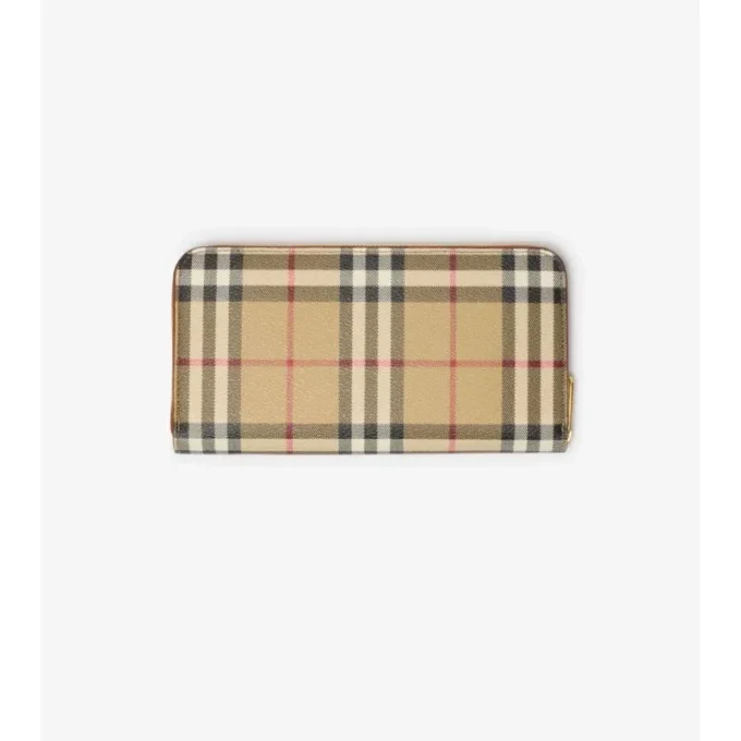 Péřová bunda s pruhem s kostkovaným vzorem Burberry na předním zipu a skládací kapucí v naší charakterist Péřová bunda s pruhem s kostkovaným vzorem Burberry na předním zipu a skládací kapucí v naší charakterist